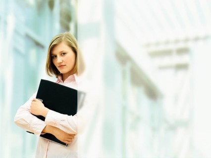 Businesswoman holding a ring binder