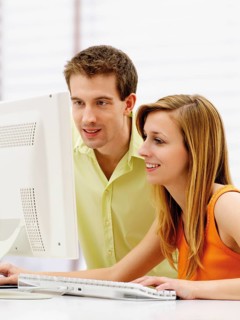 Young couple using a computer