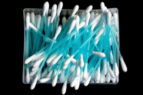 Cotton swab with plastic