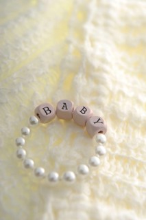 Newborn bracelet with the word Baby