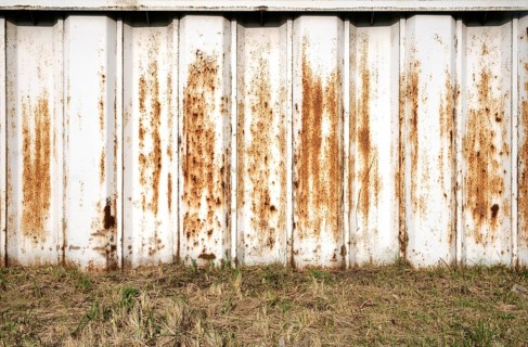 Rusty white coastal protection wall in the Port of Hamburg