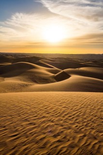 Sunset in the giant sanddunes of the Sahara