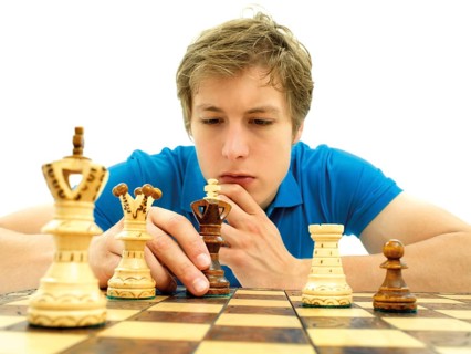 Young man playing chess