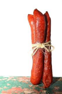 Three salami tied together