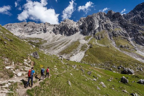 Climbers on the approach to the Imster Klettersteig via ferrata