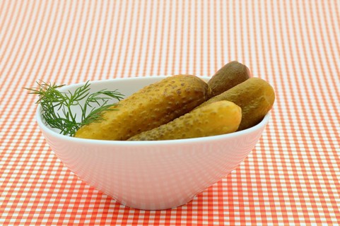 Gherkins in a white porcelain bowl