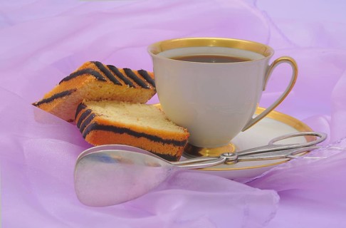 Coffee cup with a gold rim