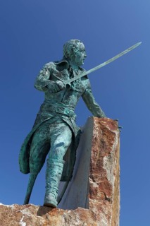 Statue of the corsair Georges Rene Le Peley de Pleville with a wooden leg