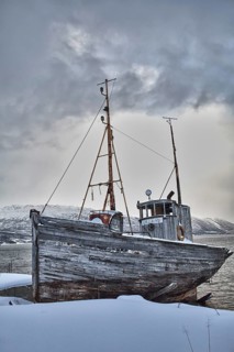 Old fishing boat in winter