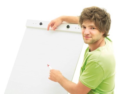Man standing in front of a flip chart