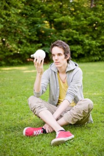 Young man sitting in nature
