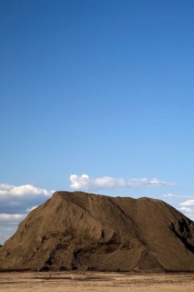 Mound of topsoil in a commercial sandpit
