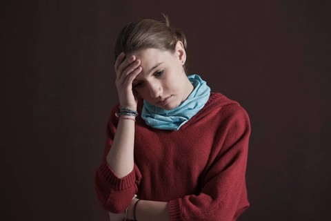 Teenage girl with a thoughtful expression