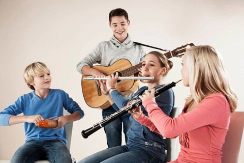 Teenagers making music together