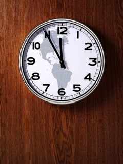 Clock with a map of North America and South America