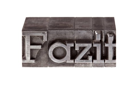 Old lead letters forming the word 'Fazit'
