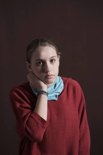 Teenage girl with a thoughtful expression