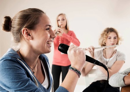 Teenagers making music together