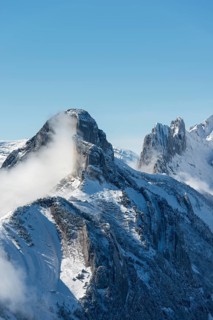 A cloud hanging next to Staubernkanzel mountain