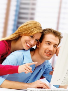 Young couple using a computer