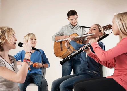 Teenagers making music together