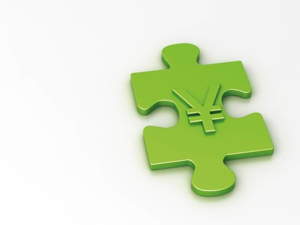 Piece of a puzzle with a Yen sign