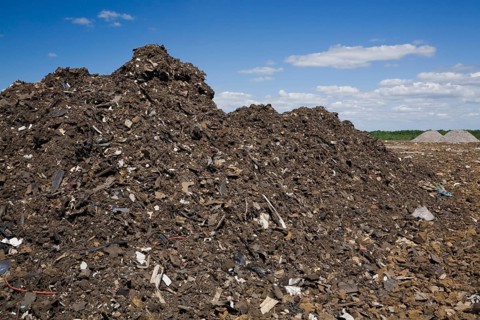 Pile of discarded automotive debris at a waste management site