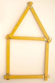 Folding rule in the shape of a house