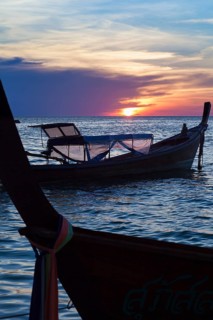 Boats at sunset from sunset beach on Ko Lipe