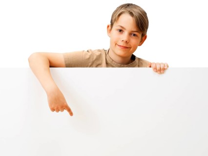 Schoolboy behind a white board