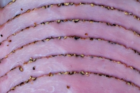 Slices of smoked ham with pepper