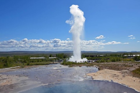 Hot water pool and erupting Strokkur Geysir
