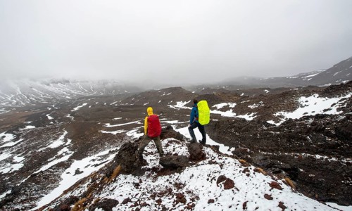 Hikers standing on stones