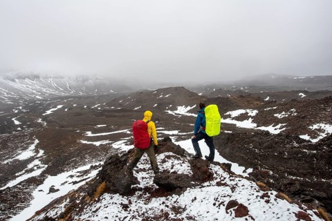 Hikers standing on stones