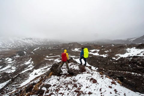Hikers standing on stones