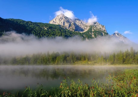 Wettersteinspitze and Lake Ferchensee with early fog