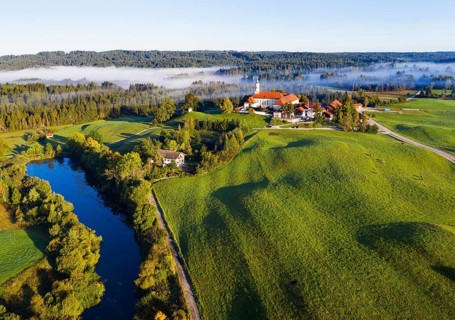 Reutberg Monastery and millpond