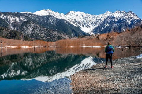 Young woman at a lake