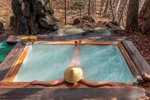 Woman bathing in an onsen