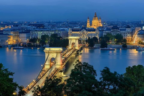 Chain bridge with Gresham Palace and St. Stephen's Basilica