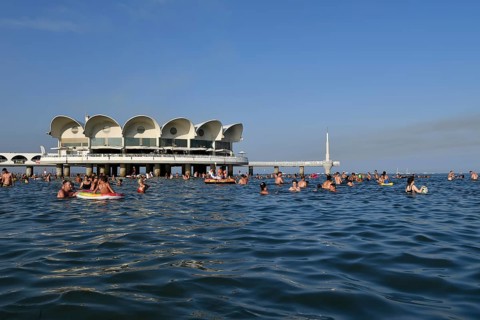 Tourists bathing in the sea