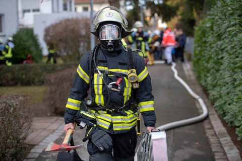 Firefighter with respiratory protection in action