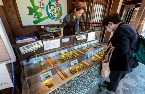 Japanese woman buys Wasabi