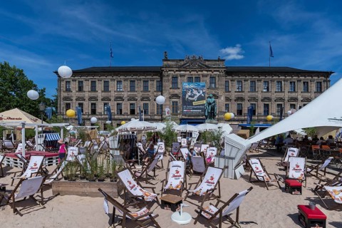 Sandy beach beach with deckchairs and beach chairs on the Erlanger Schlossplatz