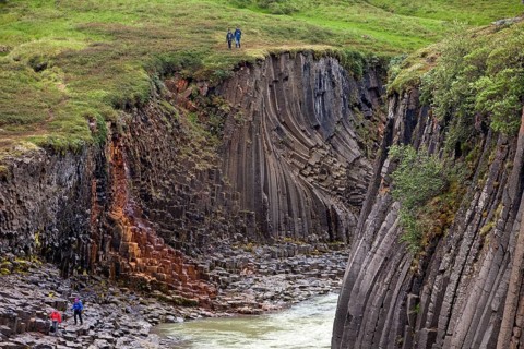 Studlagil gorge with basalt columns and glacial river Jokulsa a Bru