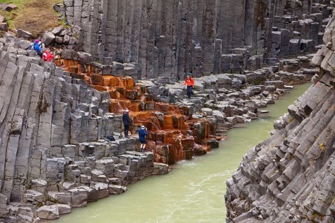 Studlagil gorge with basalt columns and glacial river Jokulsa a Bru