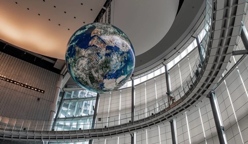 Big globe hangs from the ceiling
