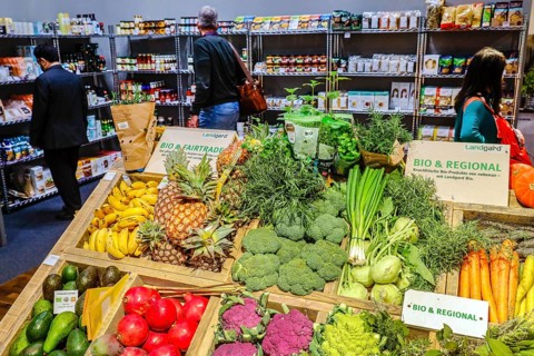 Organic vegetables and organic fruit at a vegetable counter