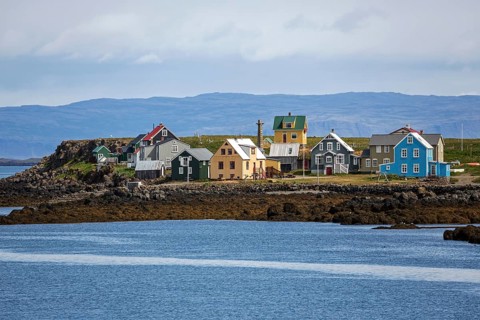 Colourful wooden houses on Flatey Island between Brjanslaekur and Stykkisholmur
