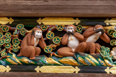 Carving of the three monkeys on the facade of the holy stable